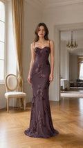 Front view of burgundy floral applique evening gown