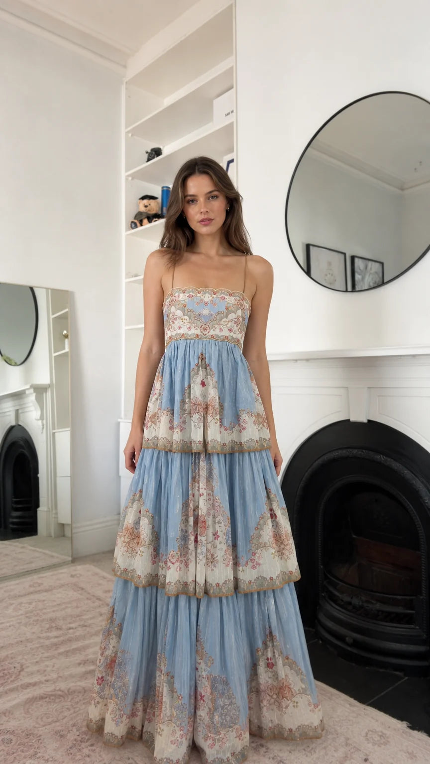 Sky blue floral tiered maxi dress shown from the front