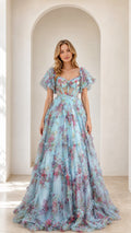 Front view of model wearing light blue floral ruffled tulle corset evening ball gown
