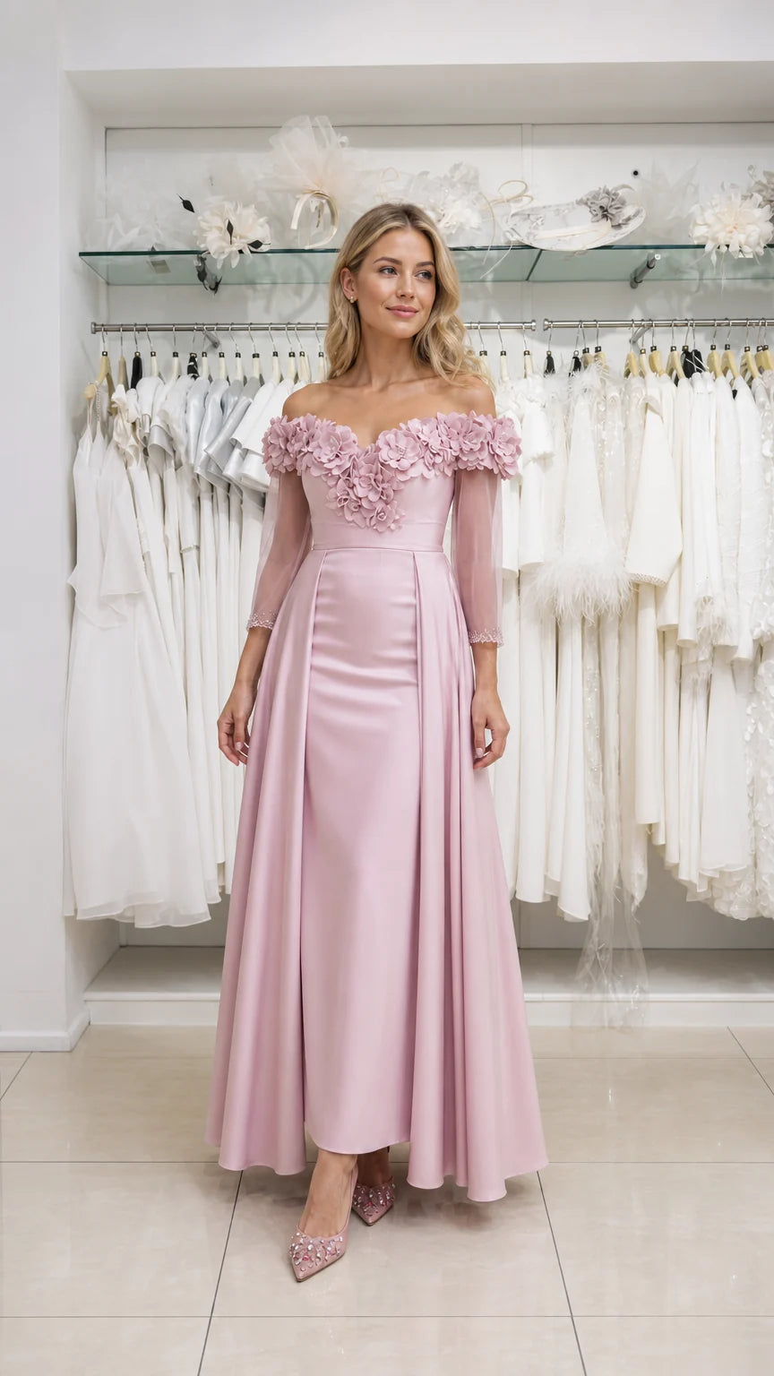 Model wearing pink off-the-shoulder evening dress, front view