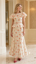 Front view of cream floral print ruffle sleeve peplum maxi dress