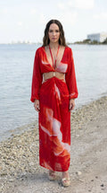 Front view of red abstract print cutout maxi dress