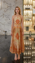 Front view of Yellow Multi paisley halter midi dress