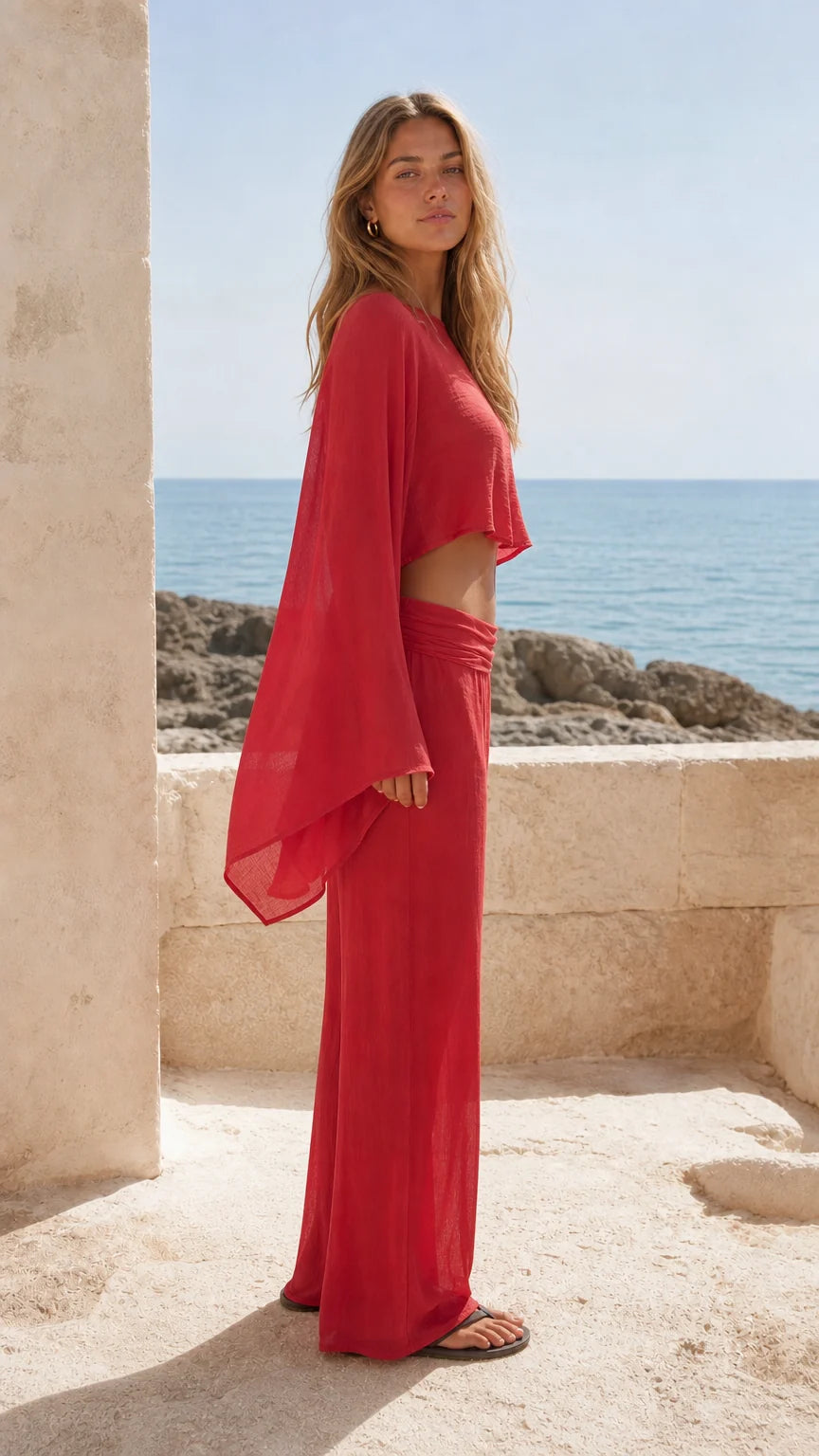 Side view of woman in red two-piece resort set