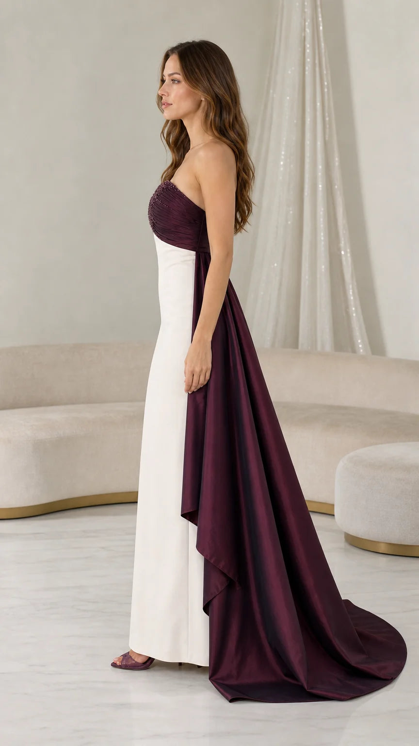 Side profile view of burgundy and white evening gown
