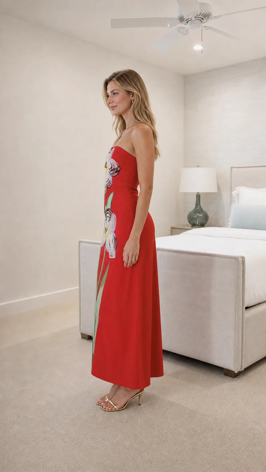 Side view of model in red strapless floral dress