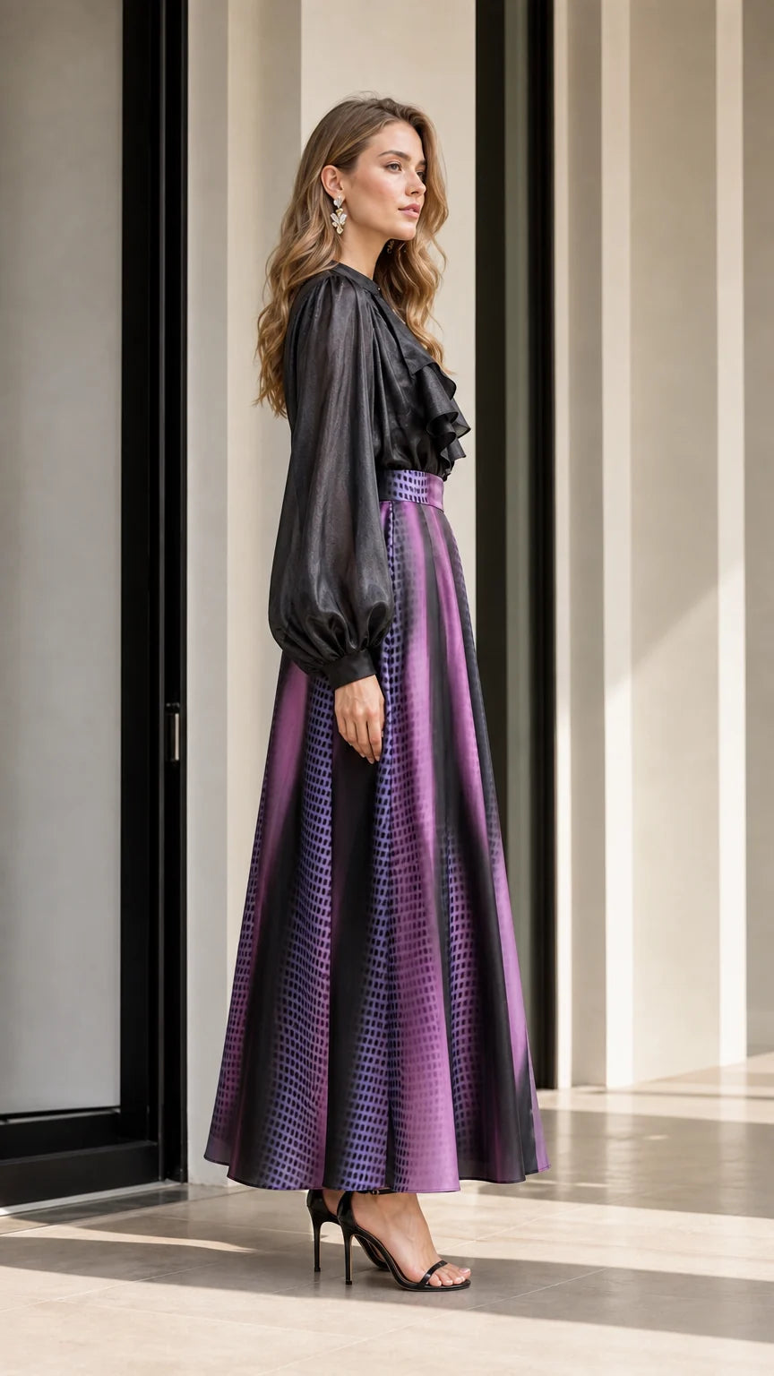 Side profile of model in purple gradient skirt set