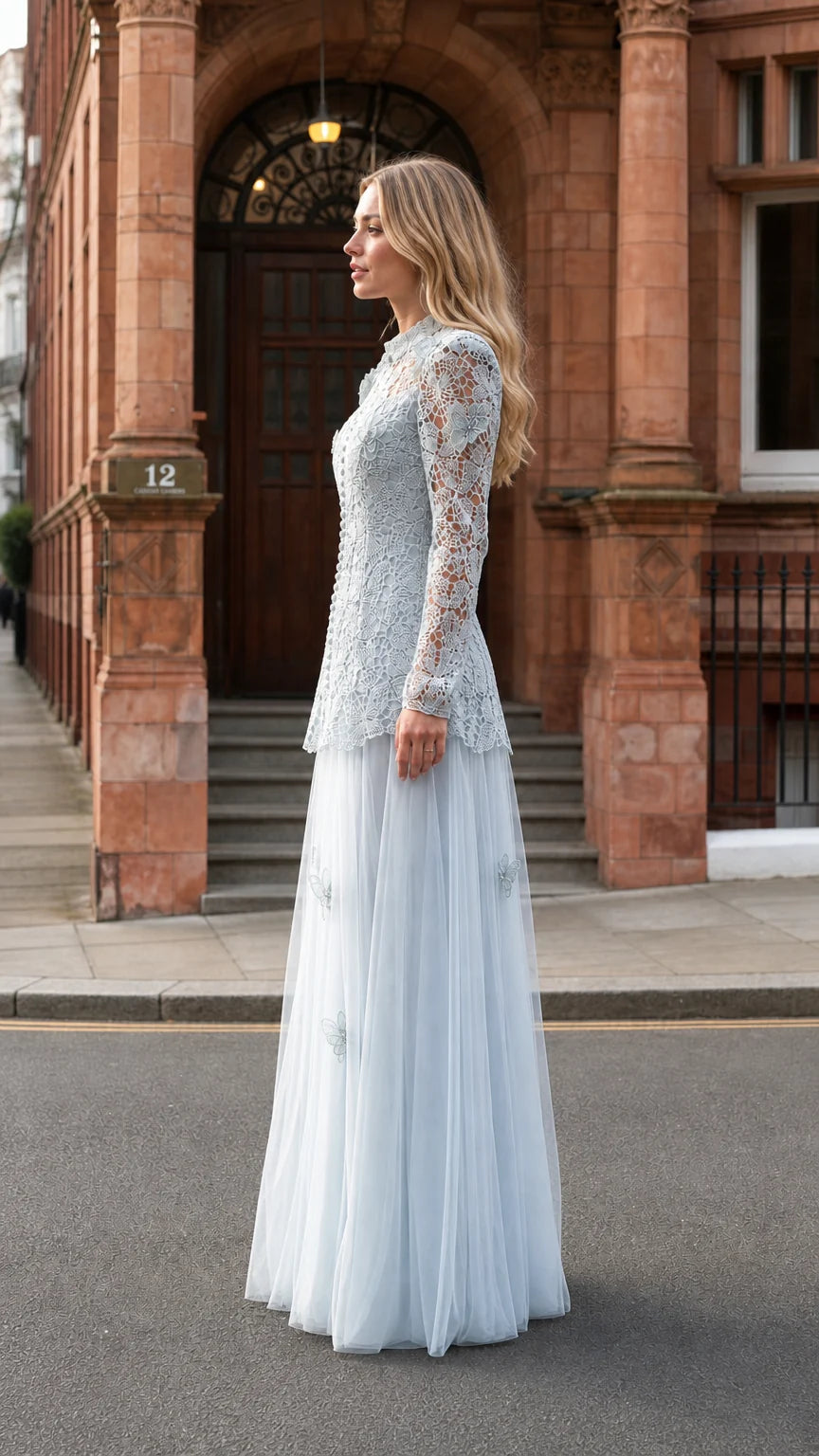 Side profile view of light blue lace maxi dress