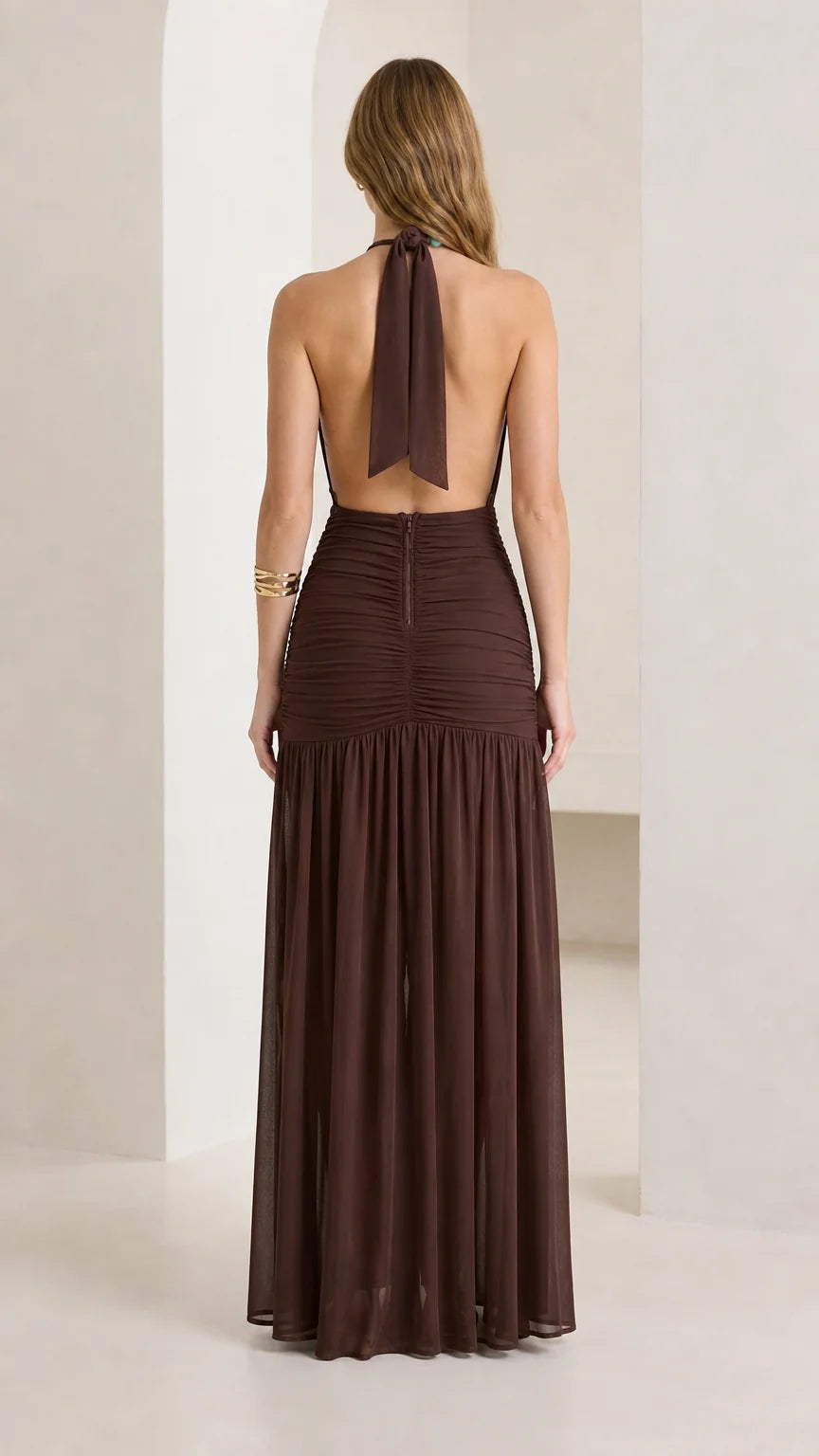 Back view of brown halter neck ruched maxi dress