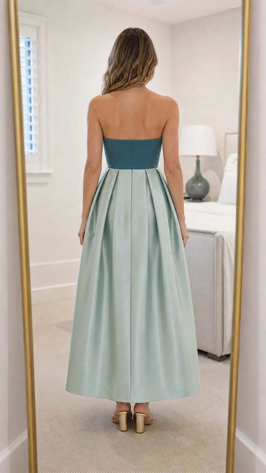 Back view of sage green strapless maxi dress