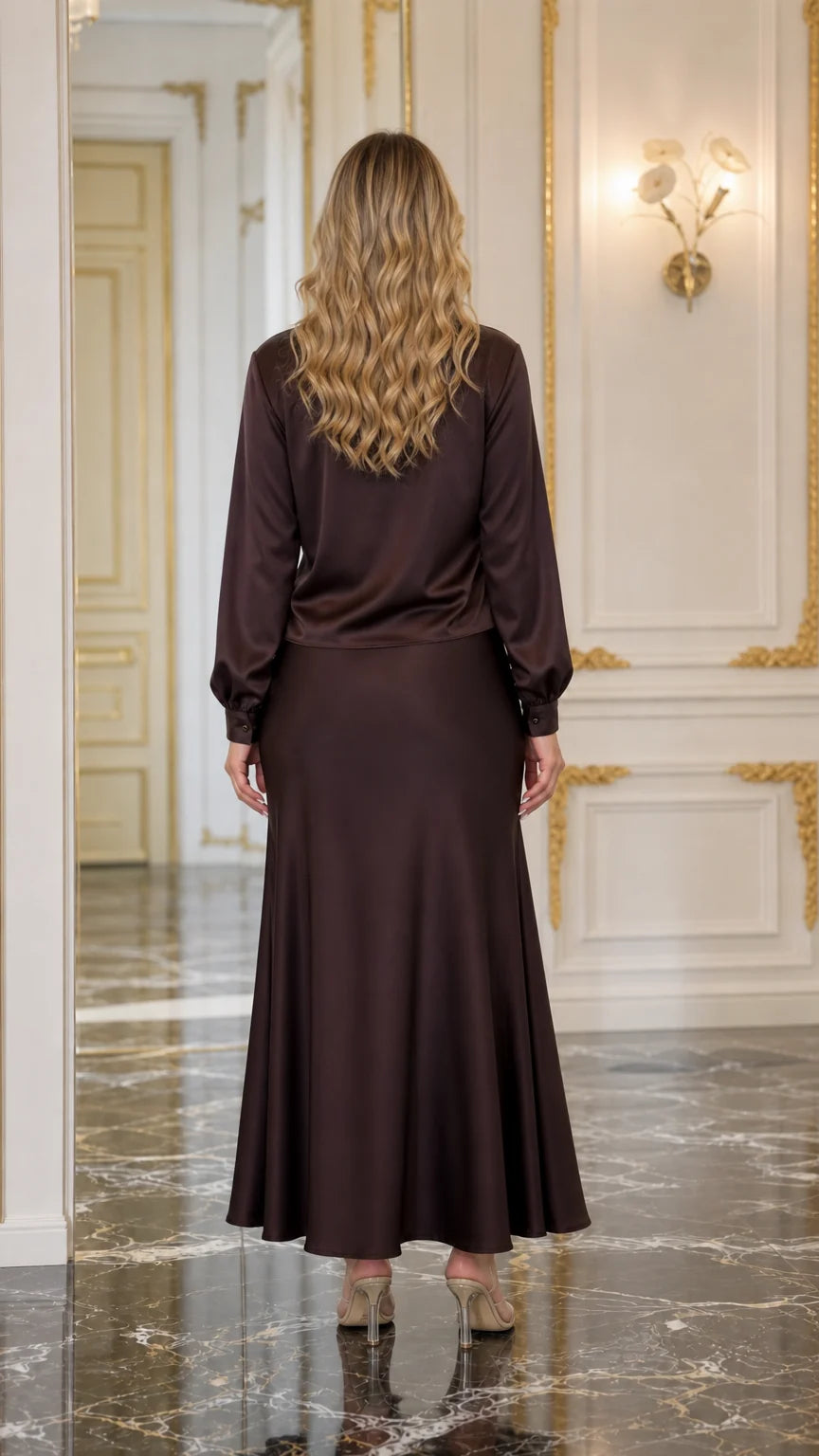 Back view of brown satin blouse and maxi skirt