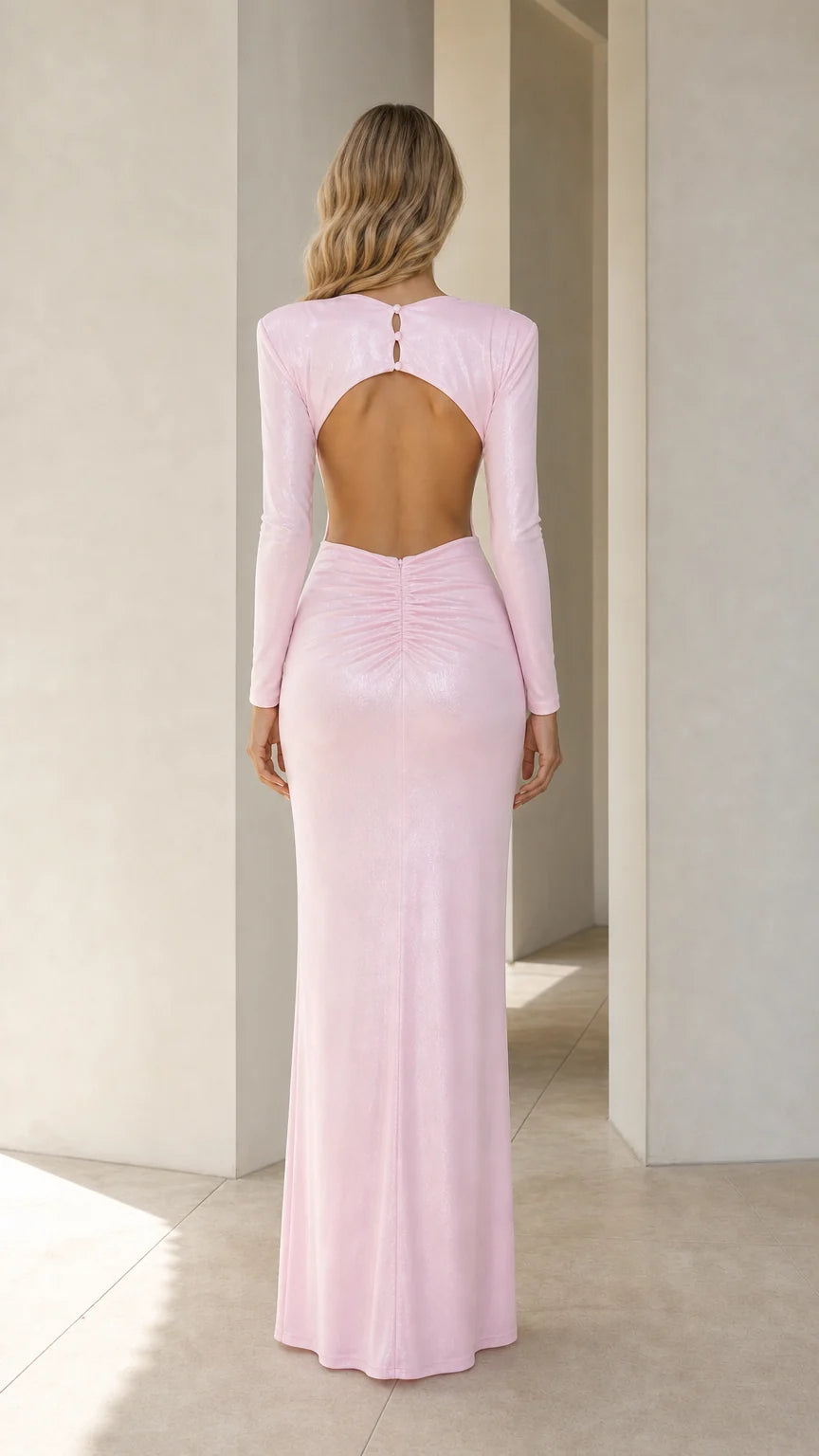 Back view of pink maxi dress with open back design