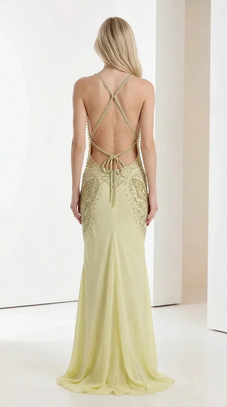 Back view showing lace-up straps on yellow maxi dress
