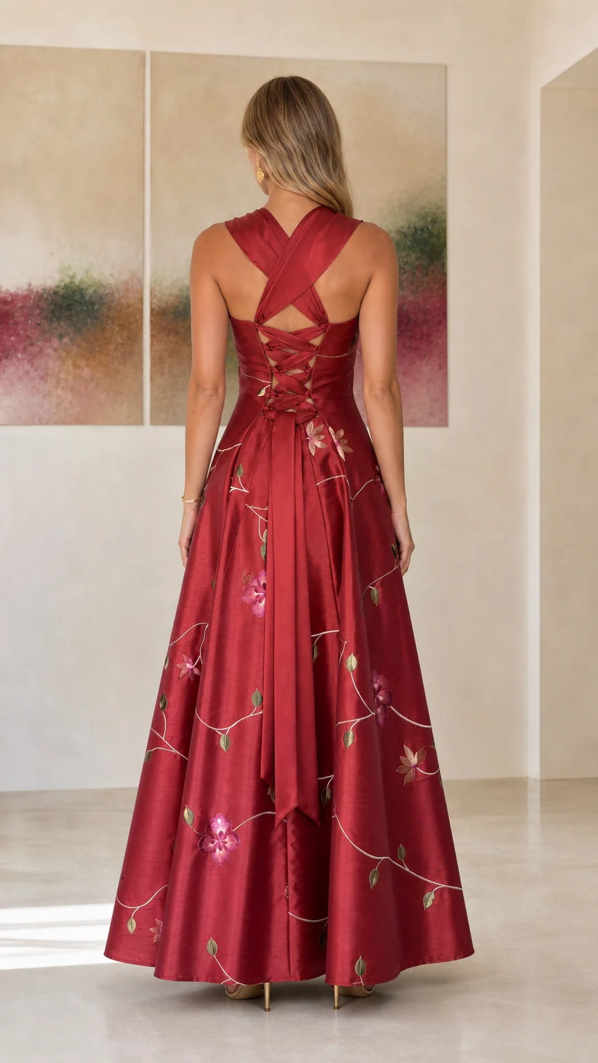 Back view showcasing lace-up details on burgundy gown