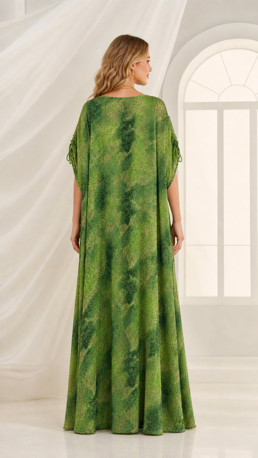 Back view of flowing green print maxi kaftan dress