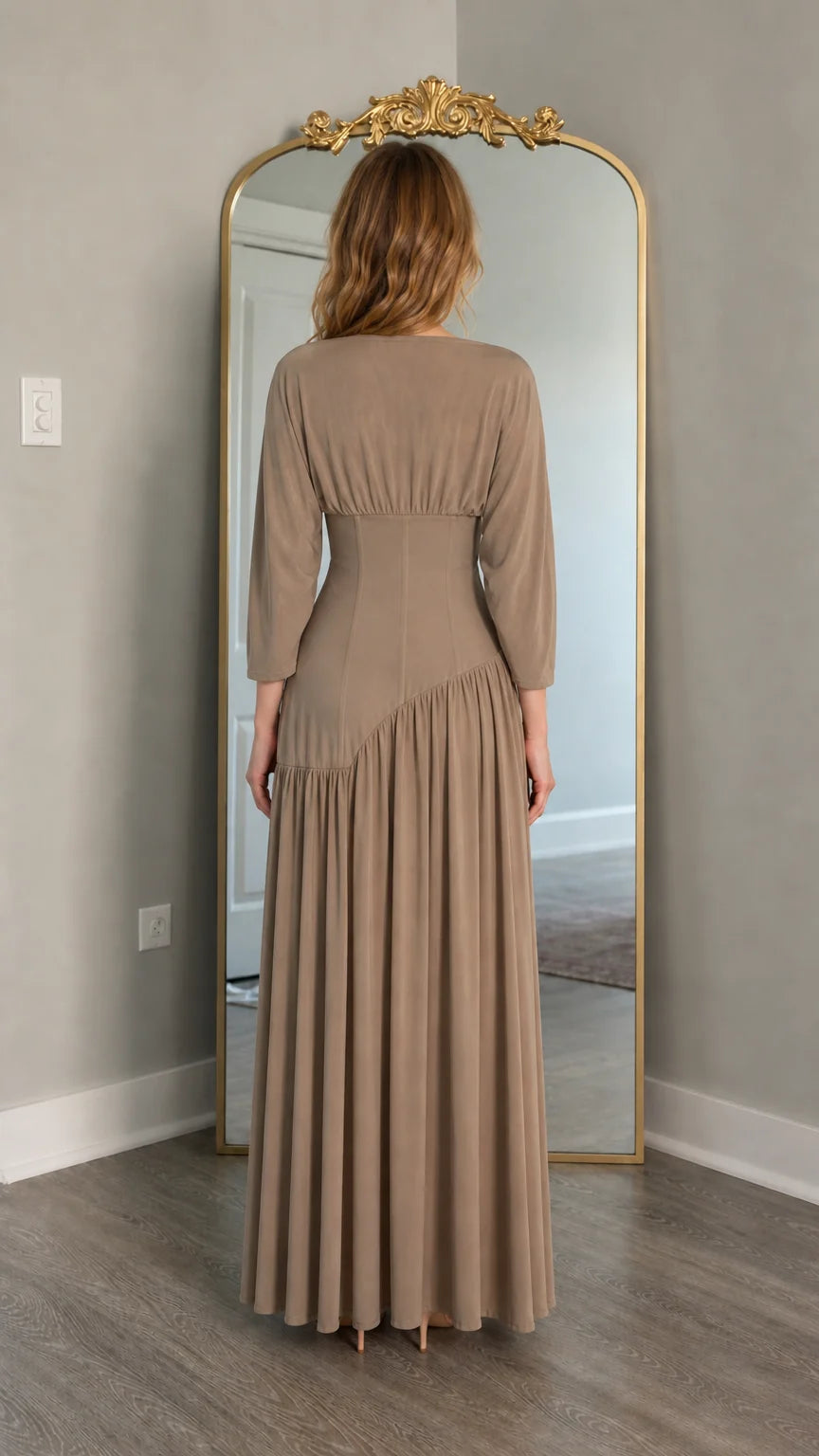 Back view of model wearing taupe maxi dress