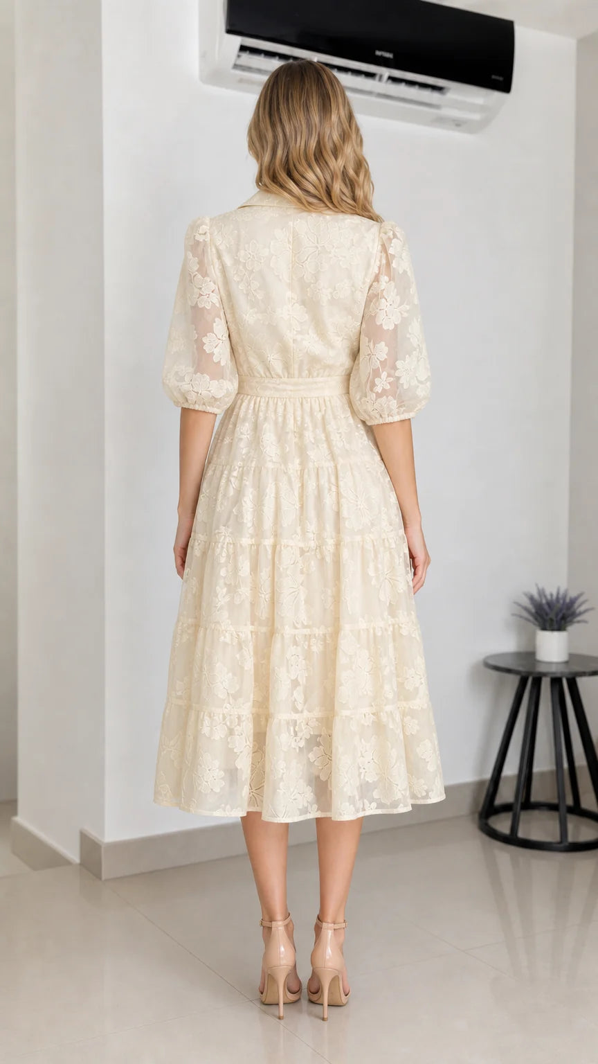 Back view of cream floral embroidered midi dress
