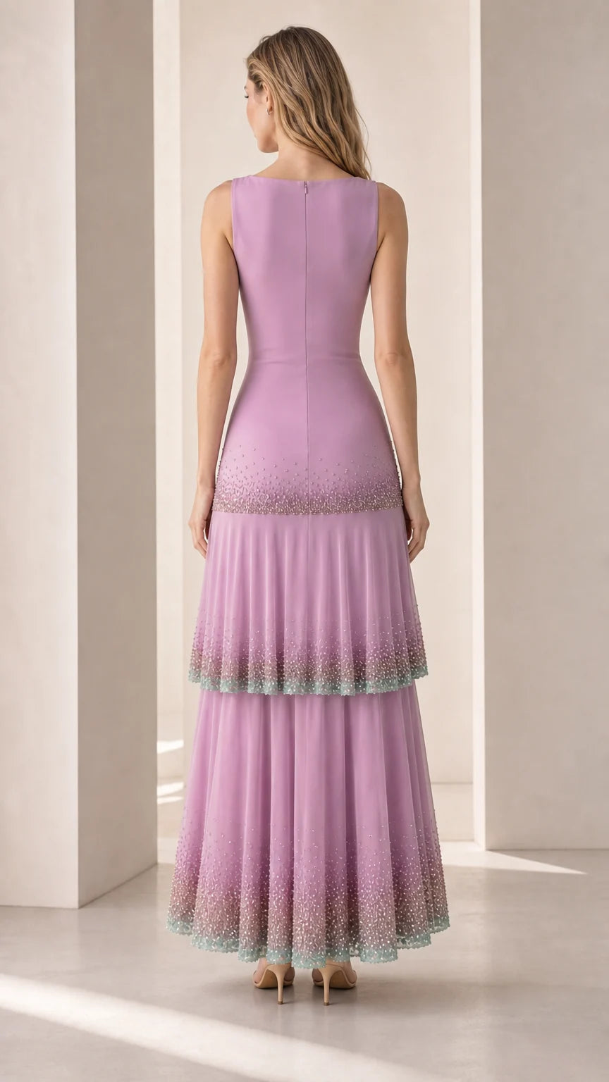 Back view of model in lavender sleeveless tiered evening dress