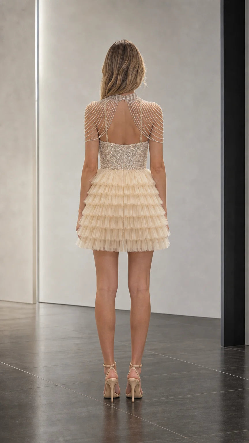 Back view showcasing keyhole back and beaded shoulder detail