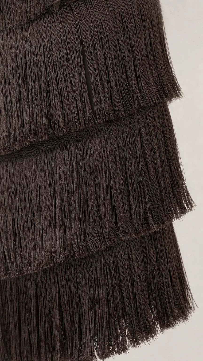 Close up detail of dark brown layered fringe texture