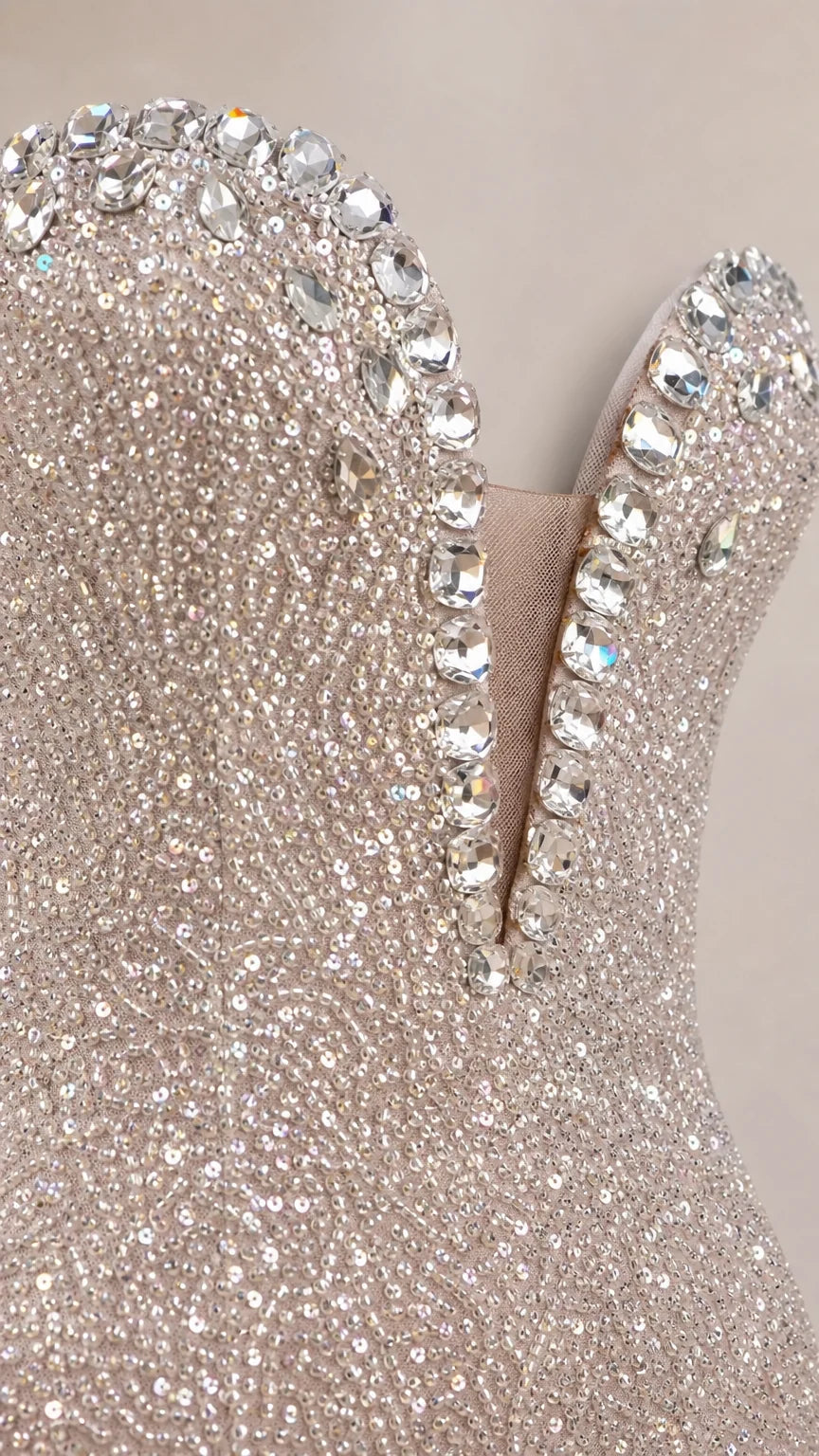 Close-up of crystal embellished plunging neckline