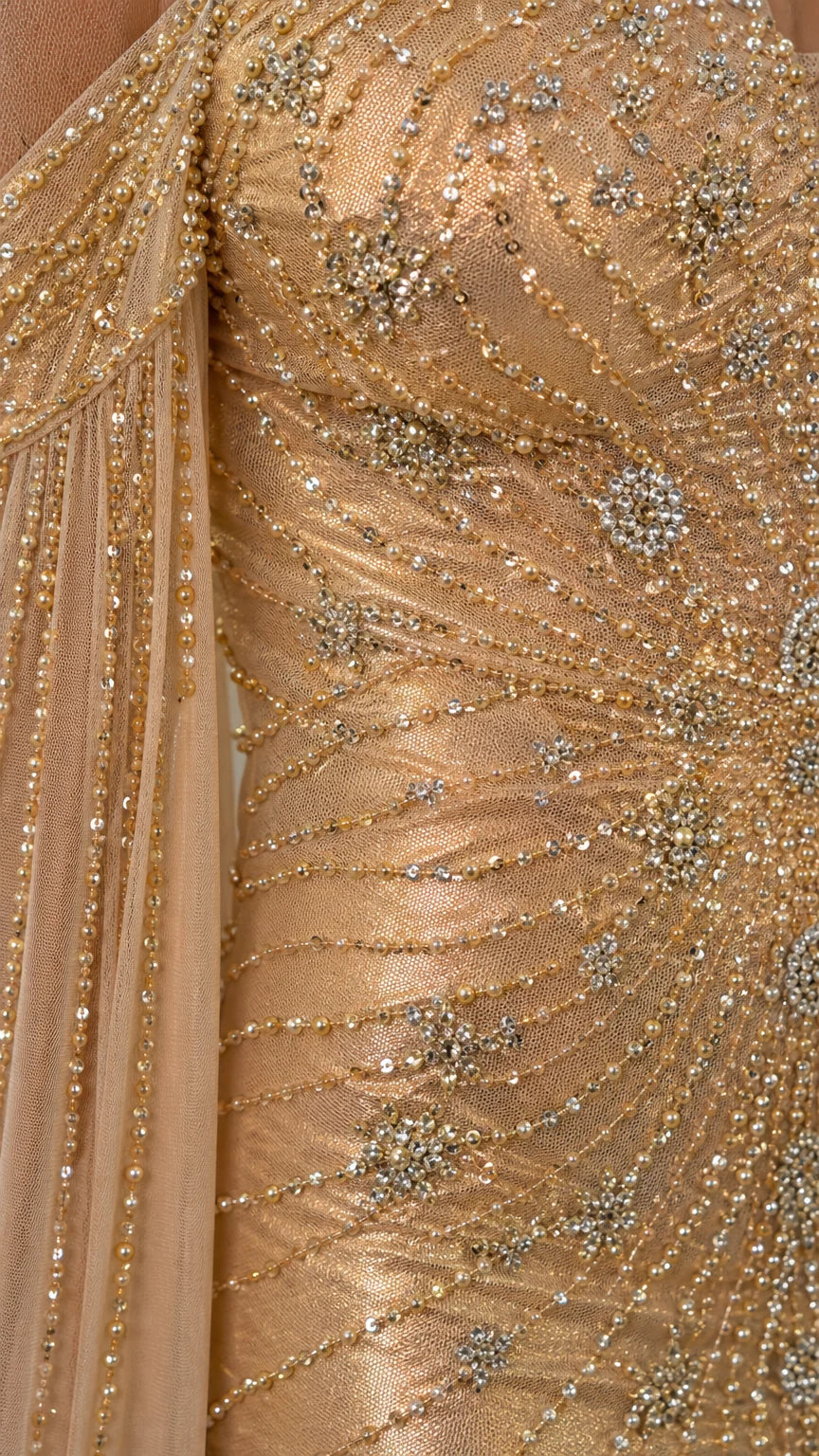 Close-up detail of beadwork and sequins on the dress