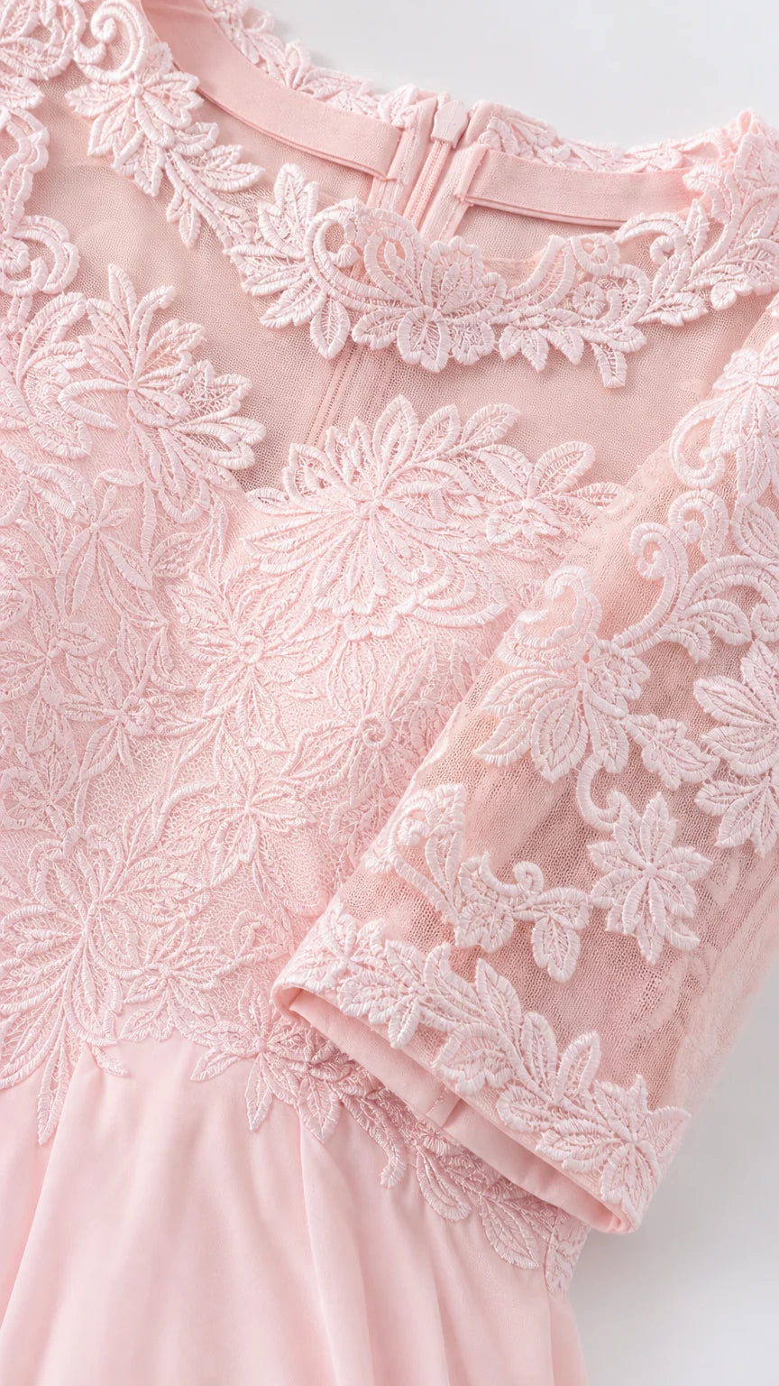 Close-up detail of lace bodice and sleeves