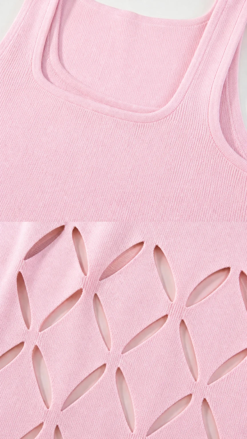 Close-up detail of square neckline and hem cutouts on pink dress