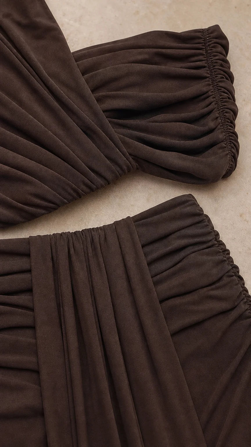 Close-up detail of fabric texture and ruching on the brown set