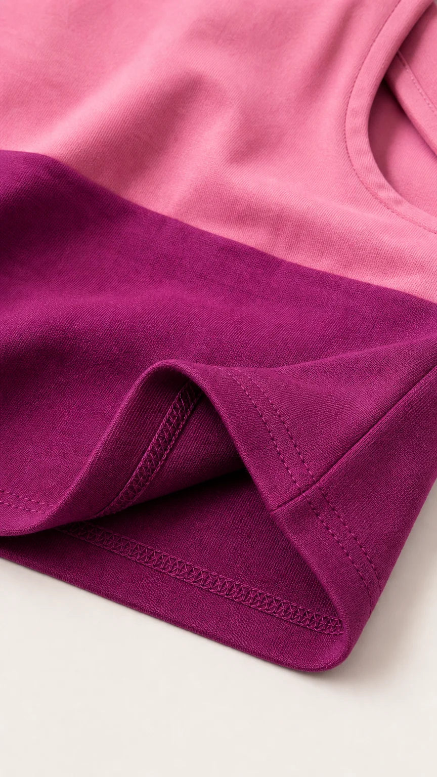 Close-up detail of pink and magenta fabric texture