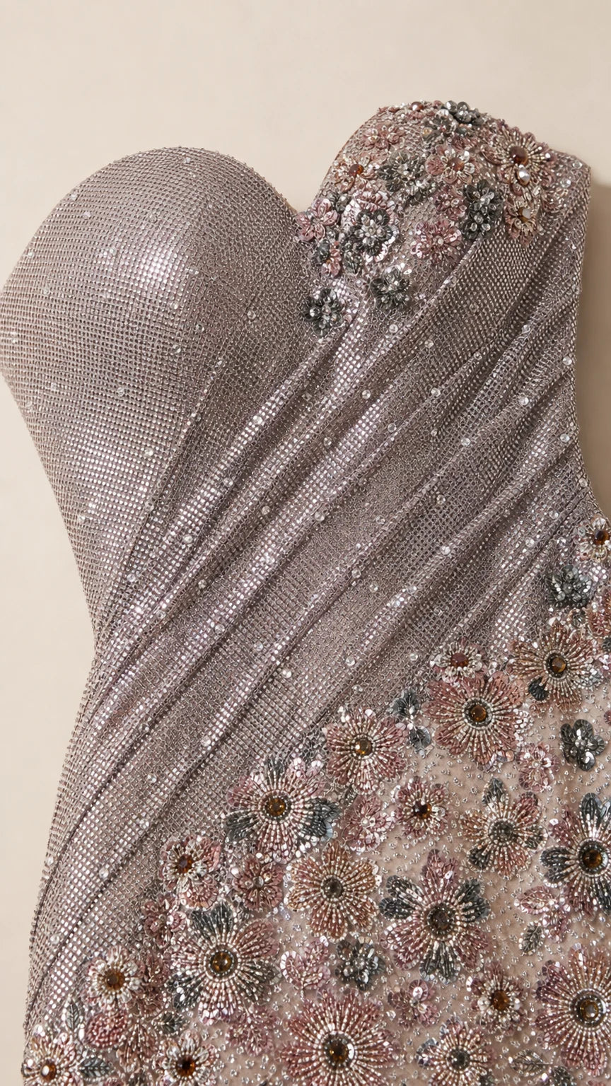 Close-up of floral embellishment and shimmering fabric texture