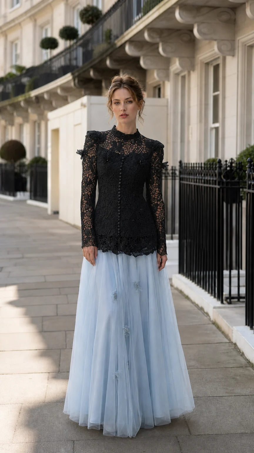 Full view of the black lace top paired with the light blue tulle skirt